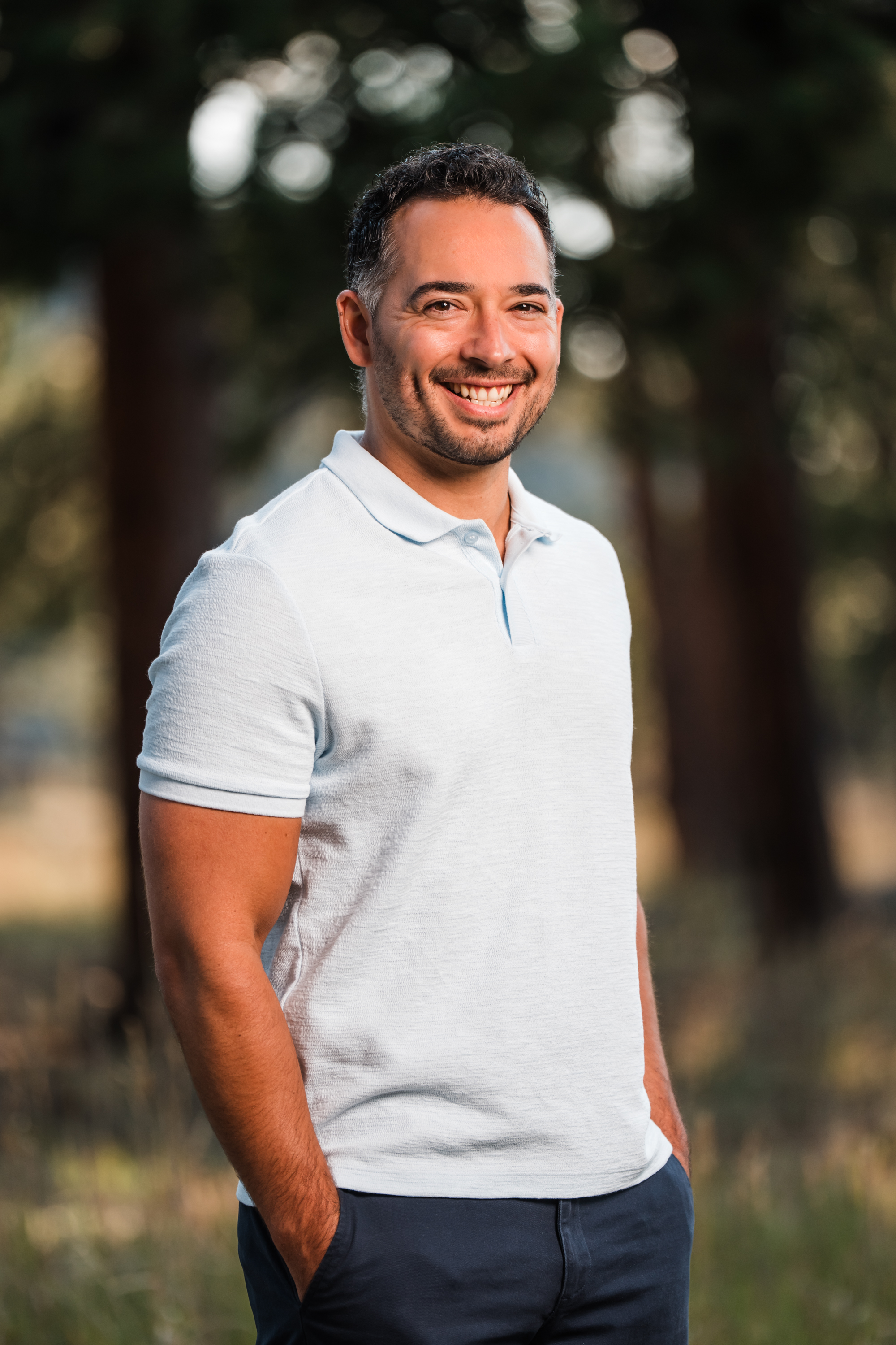 Caleb Davis smiling outdoors